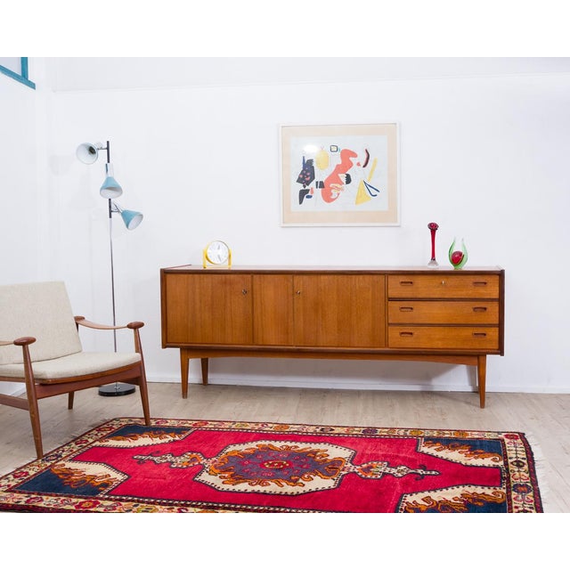 Elegant teak sideboard in scandinavian design by bartels – a mid-century classic with ample storage options. On the left,...