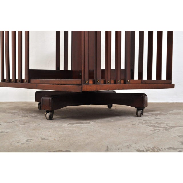 Beautiful mahogany bookcase. Dating from 1880-1900. The bookcase stands on casters and can be rotated on its base. The...