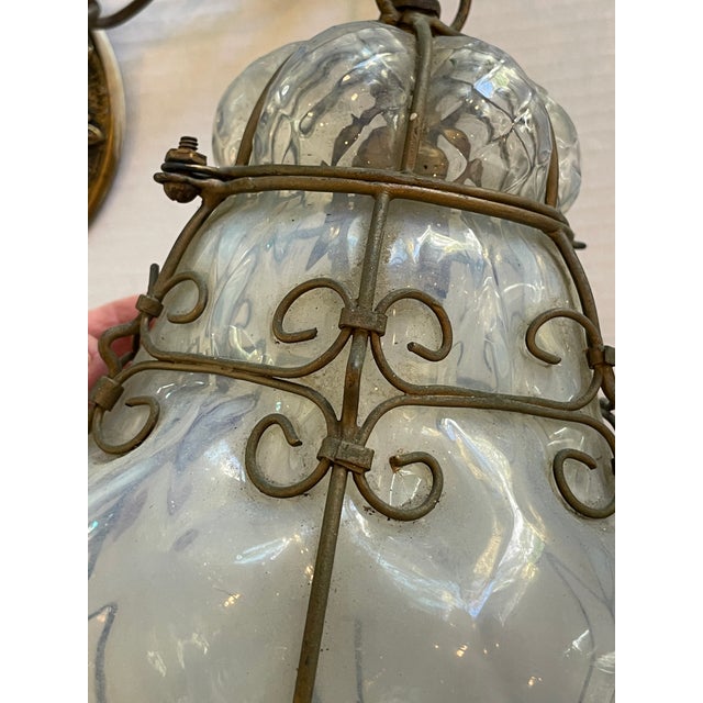 Stunning handblown Murano glass from Venice. The glass is translucent milky with the faintest hint of baby blue. Perfect...