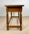 Handsome Spanish console table crafted in solid oak, featuring two drawers with geometric carved fronts, beautifully...