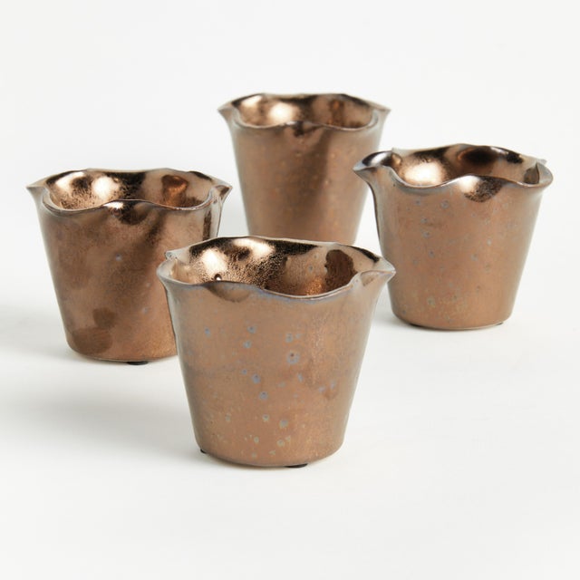 In a traditional English silhouette, this set of mini pots has a regal charm. Finished with a rich, bronze reactive glaze,...