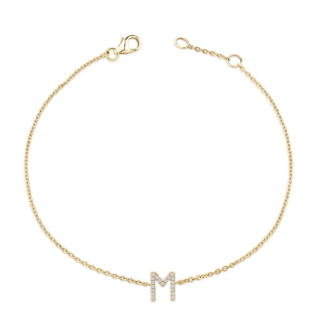Immerse yourself in the understated elegance of this 10K yellow gold bracelet, for an enrapturing shimmer that captures...