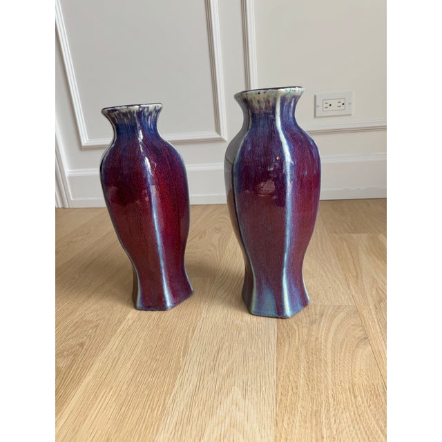 Offered is a stunning, sophisticated pair of oversized hexagonal vases by renowned American ceramic artist John Shedd....