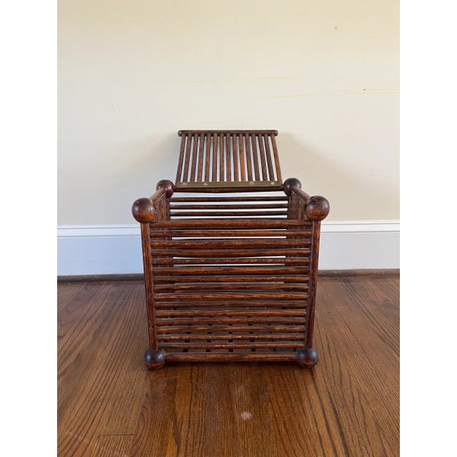 Antique storage bin made of oak. Ball and stick joint construction. Hinged top.