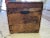 Rustic antique trunk. Great for coffee table or storage. Has marking on side dispatch war.