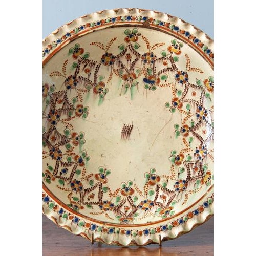 Diameter: 34 cm Height: 4.5 cm Some wear, commensurate with age.