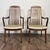 Vintage pair of MCM high back armchairs in a Danish modern style, with wood frames and original upholstered seats. Each...