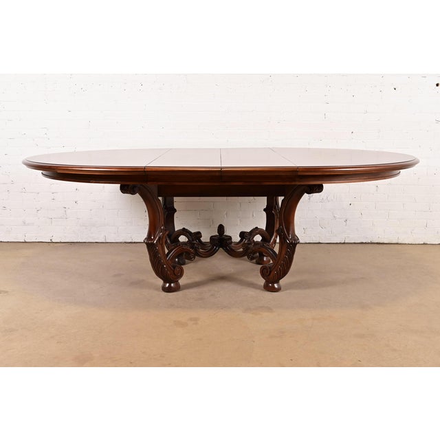 An exceptional Italian Provincial or Mediterranean style pedestal extension dining table By Henredon, "Amalfi Coast...