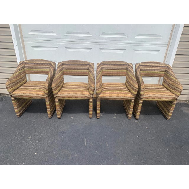 Sculptural, comfortable, and unapologetically bold, this set of four cantilevered upholstered club chairs from the 1980s...