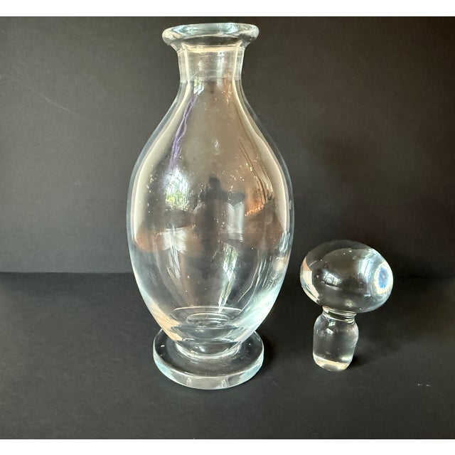 Beautiful in it's simplicity, hand blown glass perfume bottle, cruet or perhaps a vase. Hand Blown Pontil mark is...