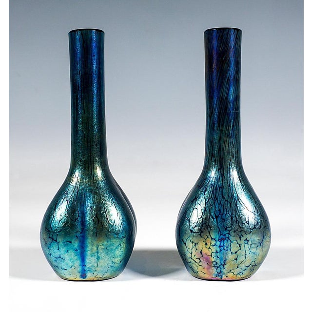 Two exquisite bohemian art nouveau glass vases: mould-blown bulbous lower section with a flush base, long narrow neck and...