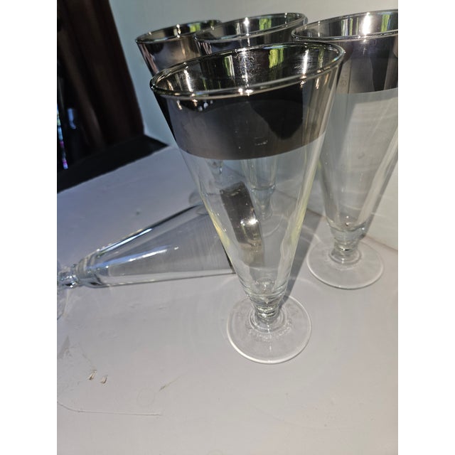 Stylish Silver Rimmed Glasses appear unused. Mid Century probably Dorothy Thorpe.