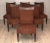 Elevate your dining space with this exquisite set of eight Donghia dining chairs, meticulously crafted to seamlessly blend...