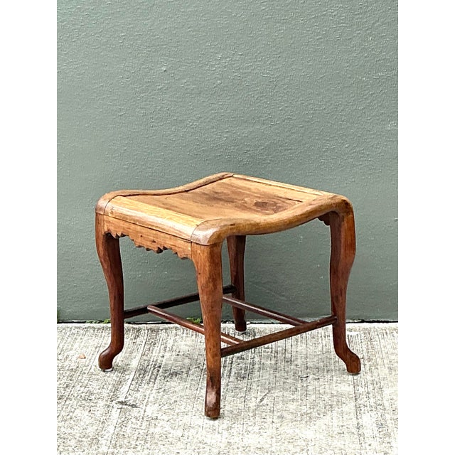 This charming vintage stool draws inspiration from classic Chinese Ming-style furniture, beautifully blending organic form...