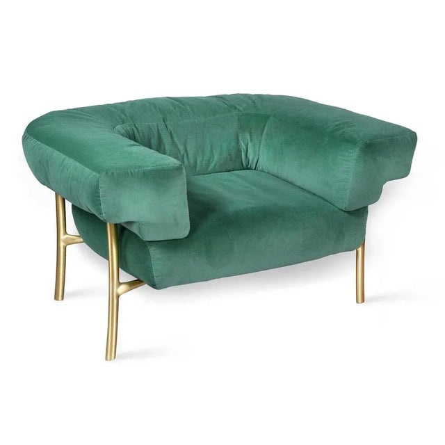 This armchair is part of the Katana Collection which borrows its name from the curve of its brass legs, recalling the...