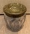 Antique British biscuit jar with ornate silverplate decorative lid and traditional etched glass detail on jar.