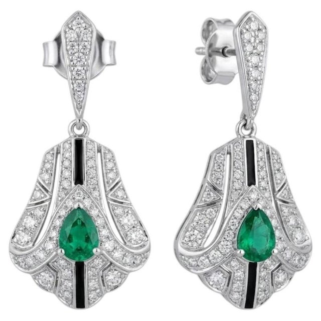 Gold Purity: 18K Solid Gold Emerald: 0.27cts Diamond: 0.67cts 18K gold Gold weight: 6.24 grams Diamond: 0.67 grams We...