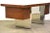 A beautiful mid century modern walnut and chrome executive desk finished on all sides designed by Roger Sprunger for...