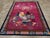 This mid-20th century Chinese Art Deco rug, is a striking example of vibrant design and intricate craftsmanship. The rich...