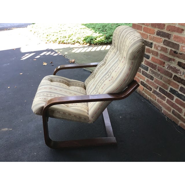 This midcentury modern rosewood rocker was produced by Westnofa. I don’t know the exact age of the chair, but it may have...