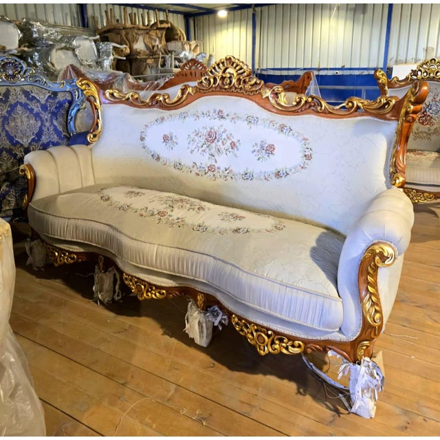 Make an unforgettable statement with this magnificent French Louis XV-style sofa, designed for those who appreciate...