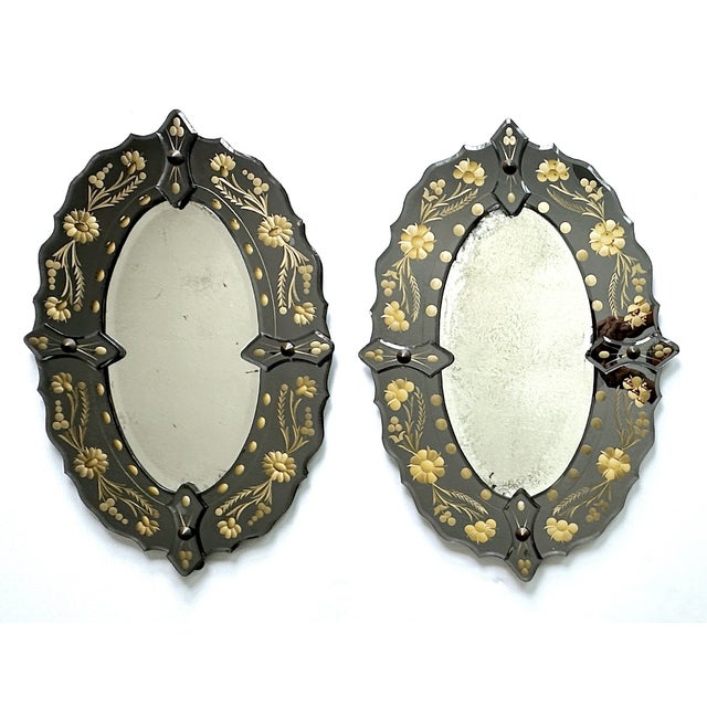 Pair of mid-century Venetian-style wall mirrors, beautifully embodying the glamorous flair of mid-20th-century Italian...