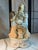 This exquisite Capodimonte figural table lamp features a lovely, seated harp player wearing a Baroque era costume. The...