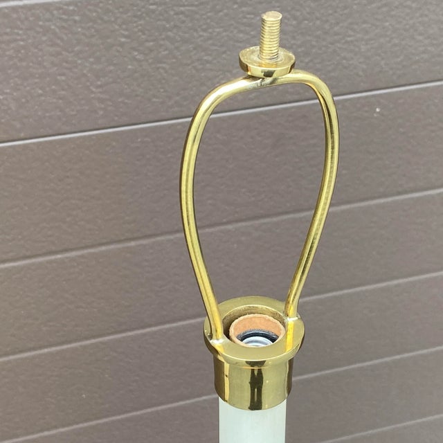 A fantastic table lamp base in brass and woven copper with a patinated finish. Uses a bulb with a smaller base. Ships...