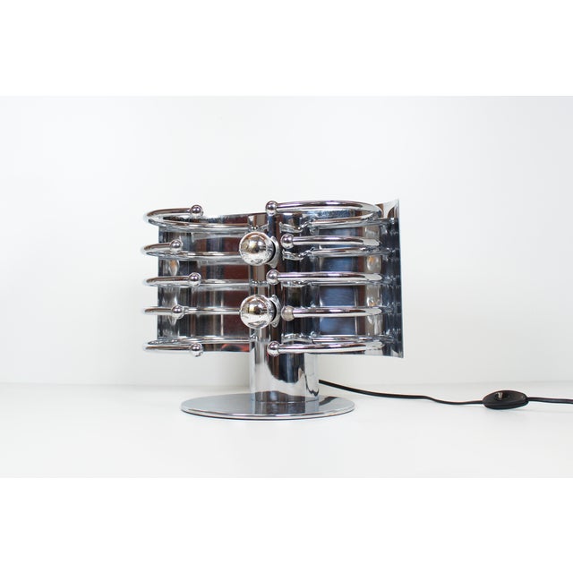 Unique and exceptional 'space age' table lamp, manufactured in Italy in the 1960s. In very good condition with signs of...