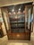 Century Furniture designer Raymond Sobota’s signature Chin Hua dinning room cabinet for displaying various collections....