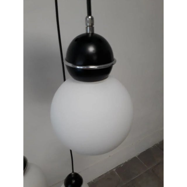 Vintage 3-Light Suspension, in Flawless conditions. Designed 1970 to 1979 Up to 250V (Europe/UK Standard).The wiring of...