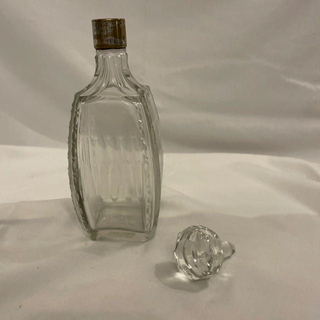 A nice English decanter circa 1900. Round and oval panel cuts. Decorative cut into the corners, which are canted. A...