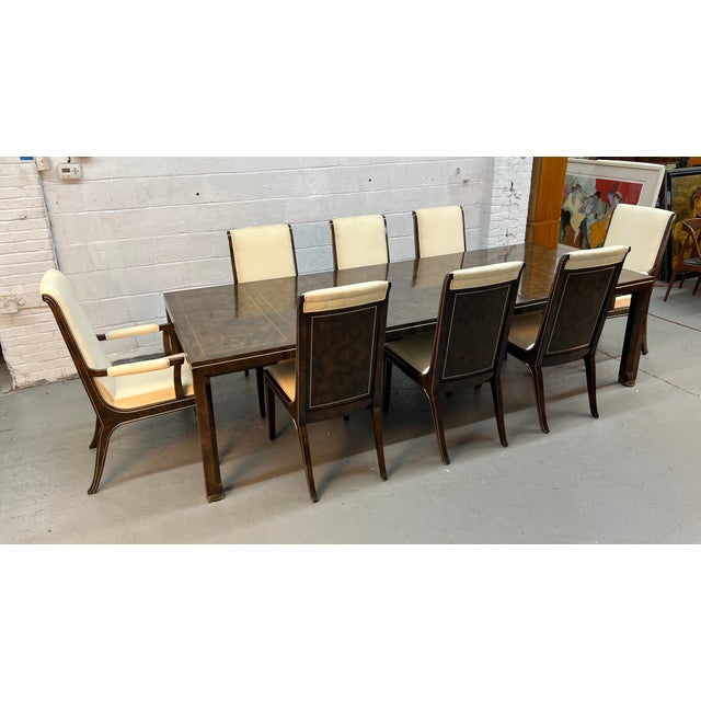 An exceptional and highly sought-after Mid-Century Modern dining set designed by William Doezema for Mastercraft,...