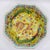 An exceptional antique Chinese porcelain octagonal bowl featuring an intricate dual-narrative design. The exterior is...