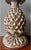 Carved wood and silver leaf stylized pineapple form lamp.