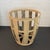 This rustic, industrial bin basket features an open strap metal construction in a patinated beige finish. The application...