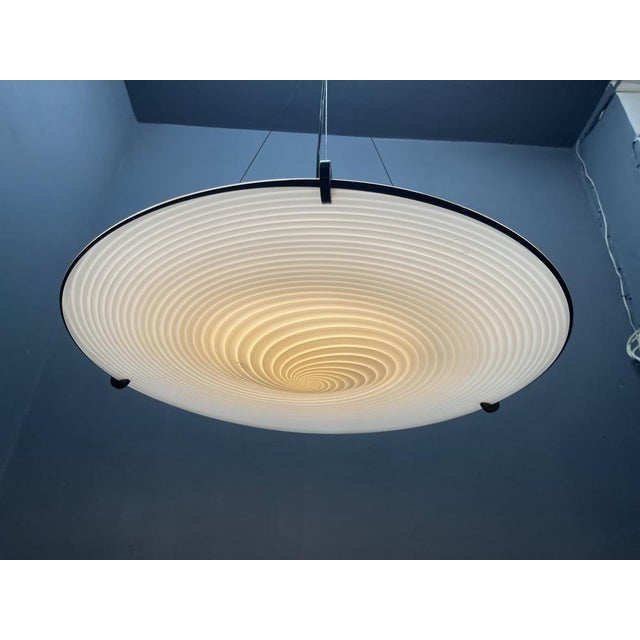 Architectural Murano Black and White Venini Swirl Light Pendant, 1980s A striking vintage pendant light, crafted in...