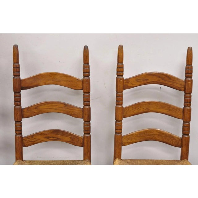 Early 20th Century Antique Ladderback Primitive Rustic Oak Wood Rush Seat Dining Chairs - Set of 4 For Sale - Image 5 of 11