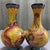 Bring a radiant burst of color and timeless elegance to your home with this exceptional Pair of Vintage Cloisonné Enamel...