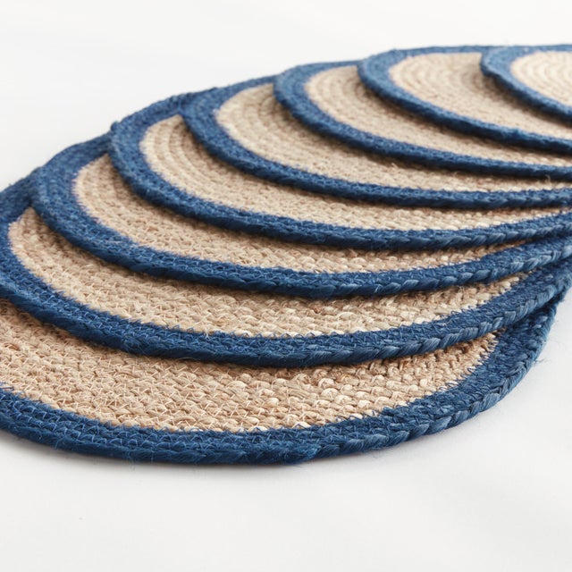 This set of eight oval placemats adds a natural element to your tablescape. Ideal for special occasions as well as...