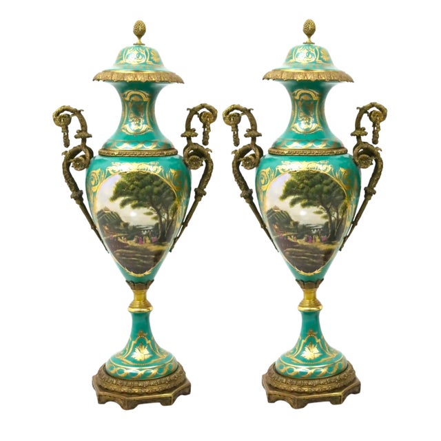 A monumental and exceptionally decorative antique French ormolu mounted Sèvres porcelain centerpiece covered urn, made in...