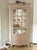 Beautiful mid-20th century French Country / Shabby Chic single-door vitrine. This charming display cabinet features a...