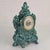 This vintage West German mantel clock is a bold decorative piece with beautiful old-world character. The ceramic case has...
