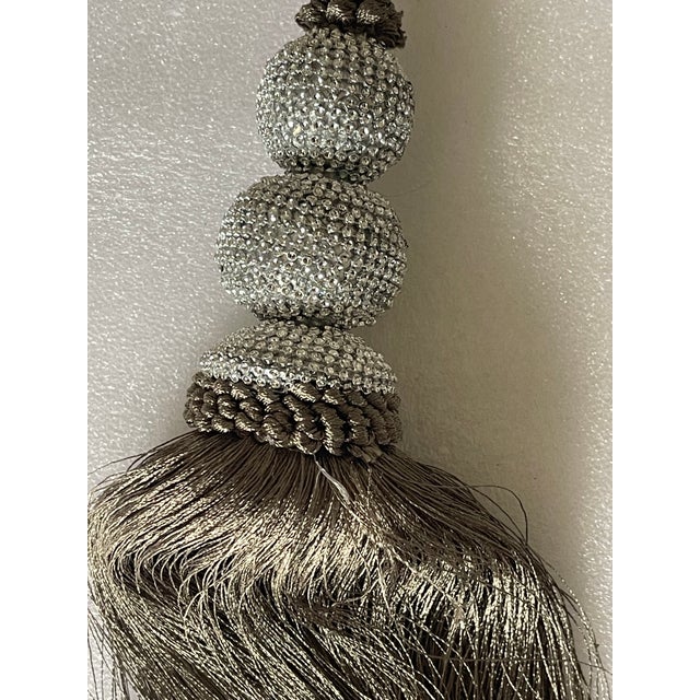 Large silk tassels with beaded tops and Tiebacks, a pair.