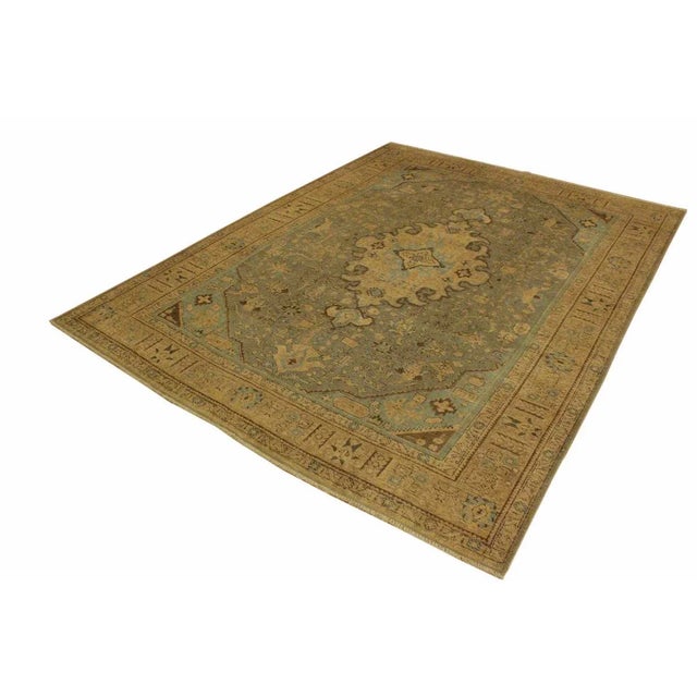 A mesmerizing addition to any décor, this brand-new hand knotted vintage distressed wool rug featuring vibrant colors and...