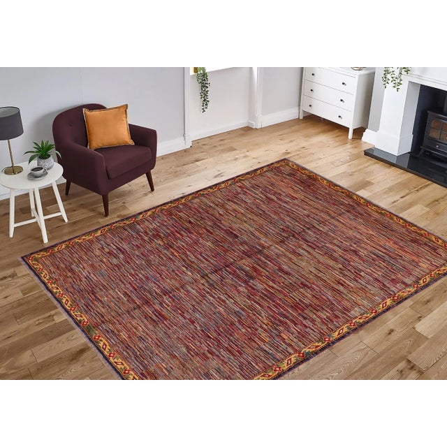 With strict standards of craftsmanship and quality of materials used this modern inspired hand knotted Gabbeh rug is a...