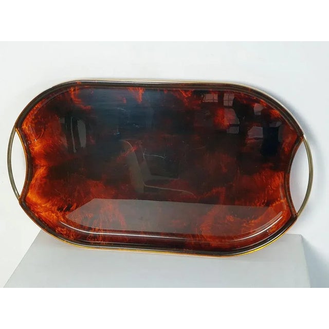 Italian oval vintage serving tray in acrylic glass with tortoise pattern and brass handles. Very good condition with minor...