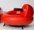 Red leather post modern lounge chair, with upholstery seat, Italy 1990