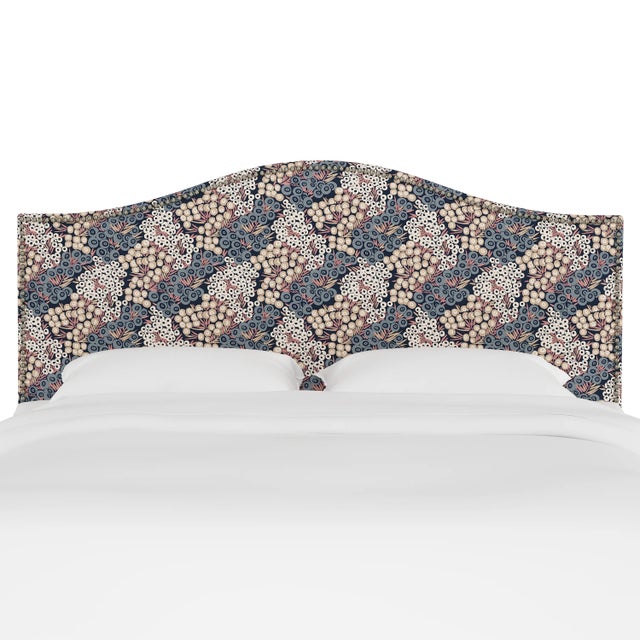 Give your interior a lift with the Headboard. Featuring the delicate curves of a classic camelback design, with subtle...