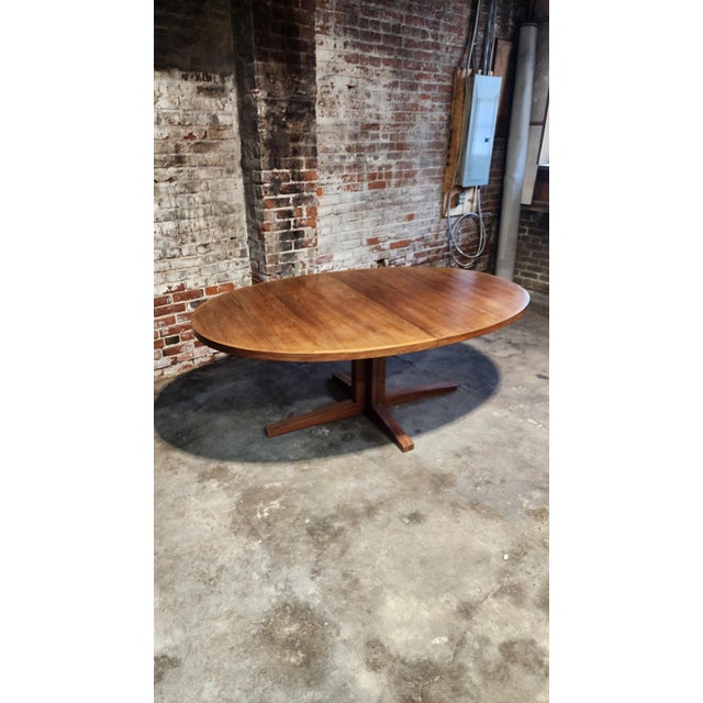 Oval Extendable Rosewood Dining Table by John Mortensen, for Heltborg Møbelfabrik in Denmark during the 1960s. Crafted in...